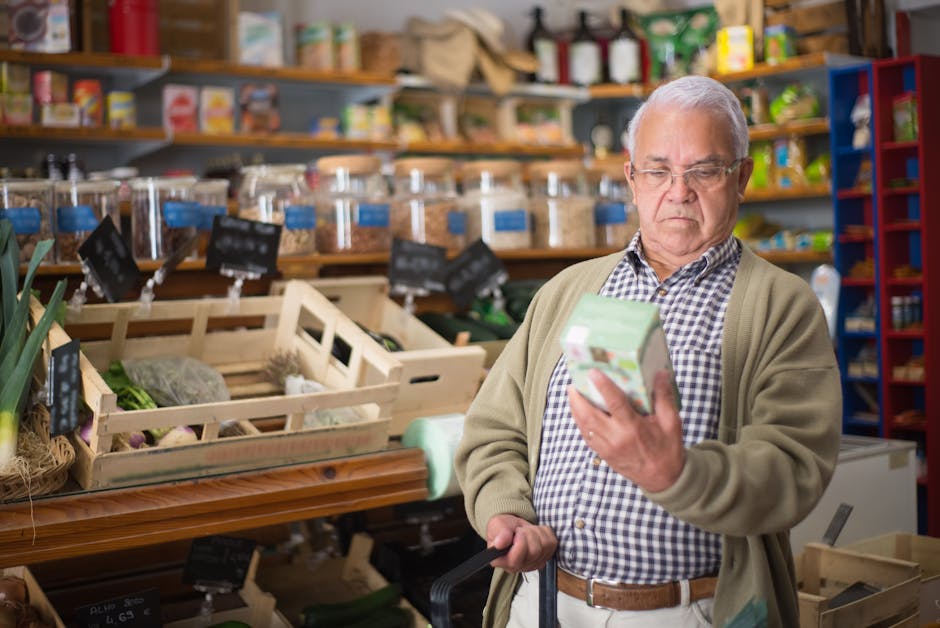 Senior man inspecting a product in a traditional Portuguese market.